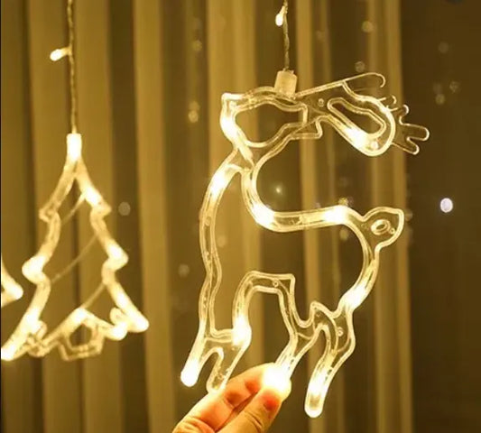Гирлянда Штора с формами колокольчик, елка, олень 12 PCS light