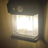 Настенный уличный светильник с солнечной панелью, фонарь с датчиком на движение SOLAR WALL LAMP YX-777 Black